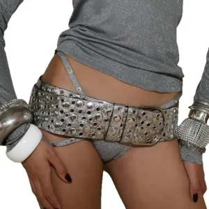 Punk style wide PU leather belt featuring metal studs and hollow eyelets for women edgy fashion detail