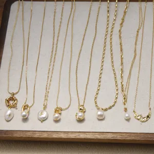 Gold pendant necklace set with natural freshwater pearls and minimalist dainty chain designs.