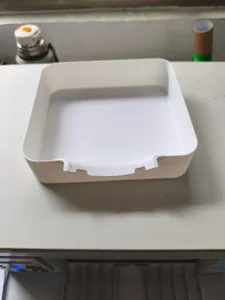 Bac de recuperation d'eau en plastique blanc pour machine a laver anti-fuite pratique.