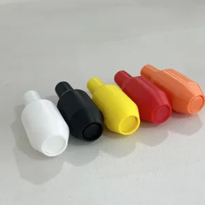 Siphon accessories detail shot, colorful plastic valve components neatly arranged.