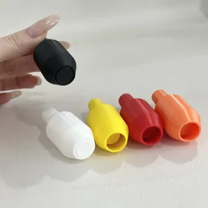Detail view of colorful plastic siphon valve accessories for garden hoses, multi-color pack.