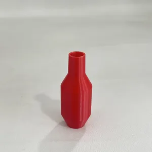 3D printed red plastic siphon accessory for garden hose replacement and fluid transfer.