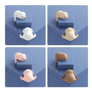 Protector de esquina de silicona con diseño de perrito para seguridad de bebé, 4 colores.