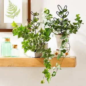 Metal leaf plant trellis for climbing potted plants, indoor garden support stake decor.