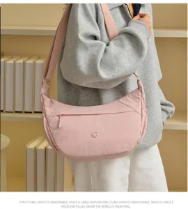 Japanese minimalist large crossbody bag for women, stylish pink nylon dumpling shoulder bag.