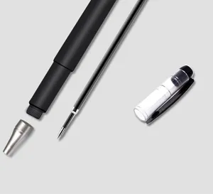 Detailed view of disassembled black gel pen including barrel, refill and cap for office use.