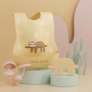 Waterproof silicone baby bib with cute sloth print, easy to clean feeding bib for toddlers.