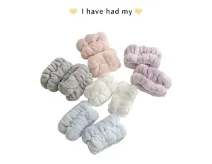 Fluffy absorbent wrist bands for face washing, soft coral fleece sweat bands detail view.