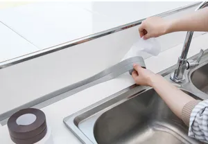 Waterproof caulking tape for kitchen sink, bathroom tub and countertop seam sealing.
