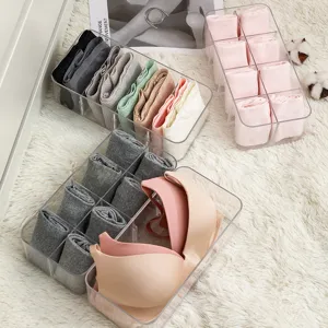 Cajas de almacenamiento transparentes para ropa interior y calcetines con divisores.