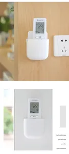 Wall-mounted storage box for remote control and phone, punch-free adhesive white organizer.