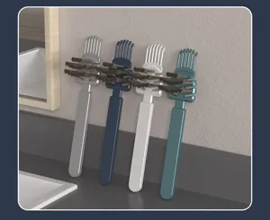 Outil de nettoyage de brosse à cheveux avec design de dents de peigne, matériau plastique.