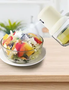 Detailed view of a kitchen glass oil spray bottle for cooking, BBQ, and salad dressing.