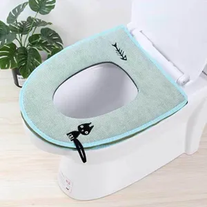 Funda de asiento de inodoro acolchada con cremallera, lindo diseño de gato y práctica asa.