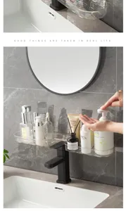 Detail shot of transparent acrylic faucet storage rack, hollow drainage design in bathroom.