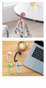 Vista detallada del gancho de bolso de mesa plegable portátil, diseño de dientes creativo escritorio.