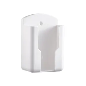 Wall-mounted white plastic remote control holder adhesive storage box for home organization.