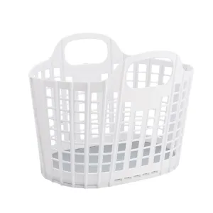Panier à linge pliable en plastique blanc avec design ajouré et poignées de transport.