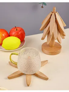 Wooden coaster set with glass cup and creative tree home desktop decoration for daily use.
