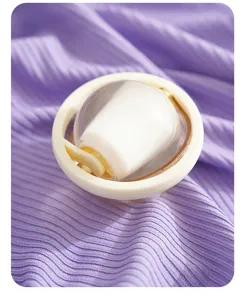Portable reusable washable lint roller for clothes removal sticky dust cleaning tool detail view.