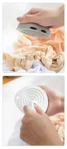 Mini asse da stiro portatile in plastica con trama a spirale 3D per lavare i vestiti senza sforzo.
