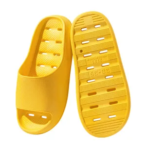 Yellow bathroom slippers for women, non-slip thick sole quick dry shower sandals for home.