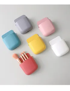 Wall-mounted storage box for remote control and phone, multi-color plastic organizer details.