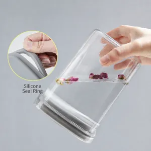 Barattolo di conservazione alimentare trasparente con coperchio in silicone ermetico.