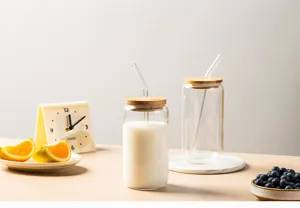 Clear glass straw cup detail view with bamboo lid and cute scene setup, perfect for daily use.