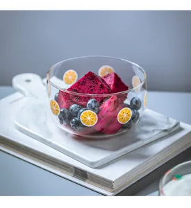 Bol à fruits en verre transparent avec motif de citron, idéal pour salade et dessert.