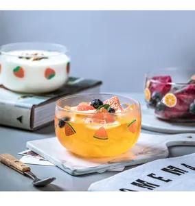 Bol en verre transparent avec motif de fruits, idéal pour salade de fruits, yaourt et desserts.