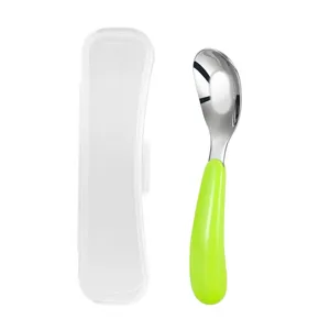 Stainless steel baby spoon with storage box, ergonomic green handle for toddler feeding.