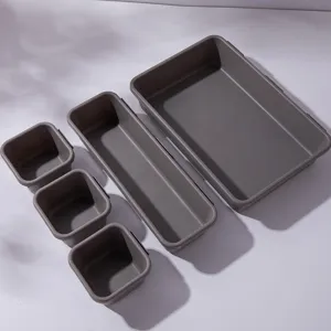 Detailaufnahme von grauen Kunststoff Schubladen-Organizer Set für Schreibtisch Aufbewahrung.