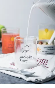 Clear glass cup with cute rain cloud pattern for milk, coffee, juice, daily breakfast use.