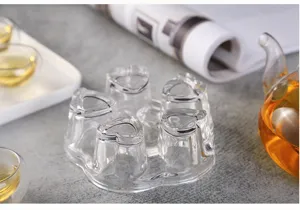 Théière en verre borosilicaté résistant à la chaleur et bel ensemble de tasses à thé.