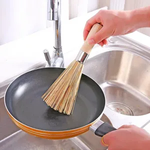 Natural bamboo pot brush with long handle, eco-friendly kitchen dish washing cleaning tool.