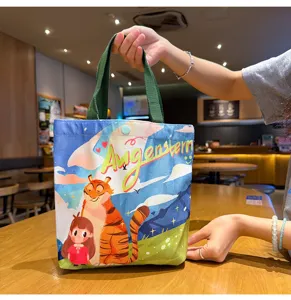 Cute cartoon canvas handbag featuring tiger and girl illustration, casual daily tote bag.