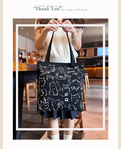 Cute cat print canvas tote bag for women, large capacity shoulder bag for daily commute.