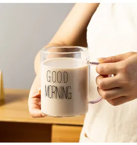 Close-up detail of the clear glass mug with morning print, perfect for daily coffee.
