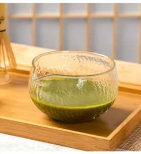 Hammered glass matcha bowl detail, perfect for traditional Japanese tea ceremony preparation.