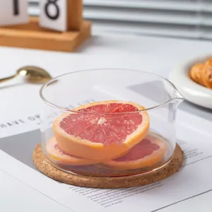 Bol verseur en verre borosilicaté transparent résistant à la chaleur pour cuisine.