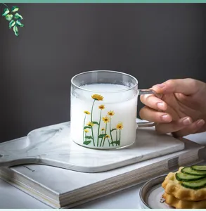 Clear glass mug with cute daisy floral print handle cup for home breakfast milk coffee.