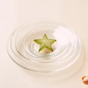 Piccolo piatto rotondo di vetro trasparente piattino impilato vassoio snack caffè.