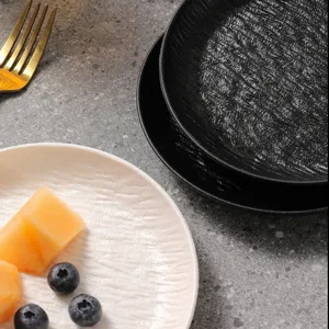Moderne kreative Knochenschale Set, schicke schwarz-weiße kleine Teller für den Tisch.