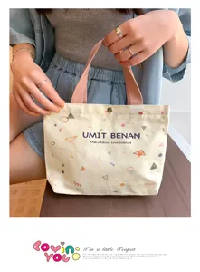 Small canvas tote bag for women, cute geometric print lunch bag and casual handbag with pink handles.