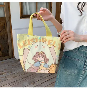 Detailed view of the cute cartoon bear canvas tote bag, perfect for daily commuting.
