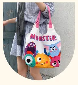 Cute monster print canvas tote bag, casual shoulder bag for women and students daily use.