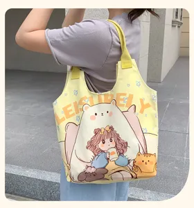 Cute cartoon print yellow canvas tote bag, casual large capacity shoulder bag for daily commuting.