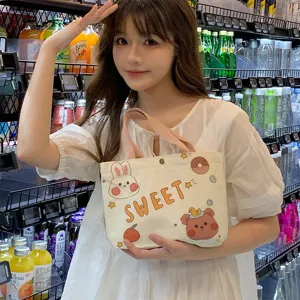 Korean style cartoon canvas tote bag for women, cute casual handbag and lunch bag for daily work.