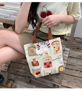Cute cartoon canvas tote bag with bread and animal prints, perfect for daily casual commuting.